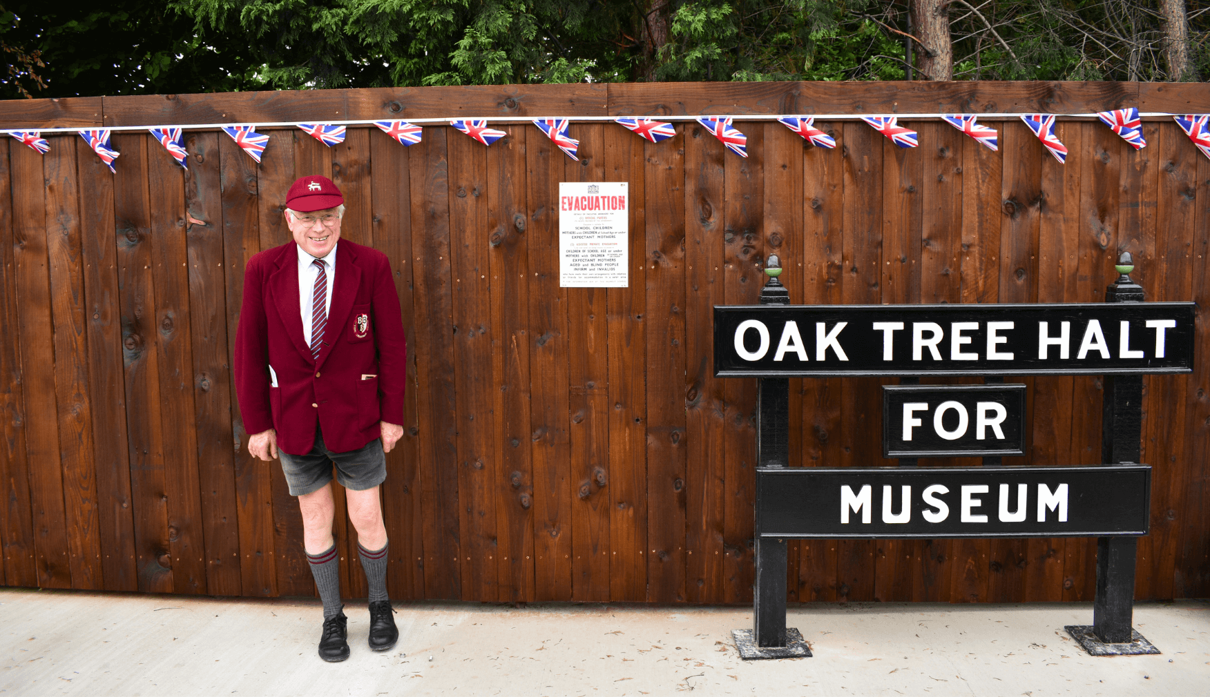 Man dressed in school outfit at 1940s event