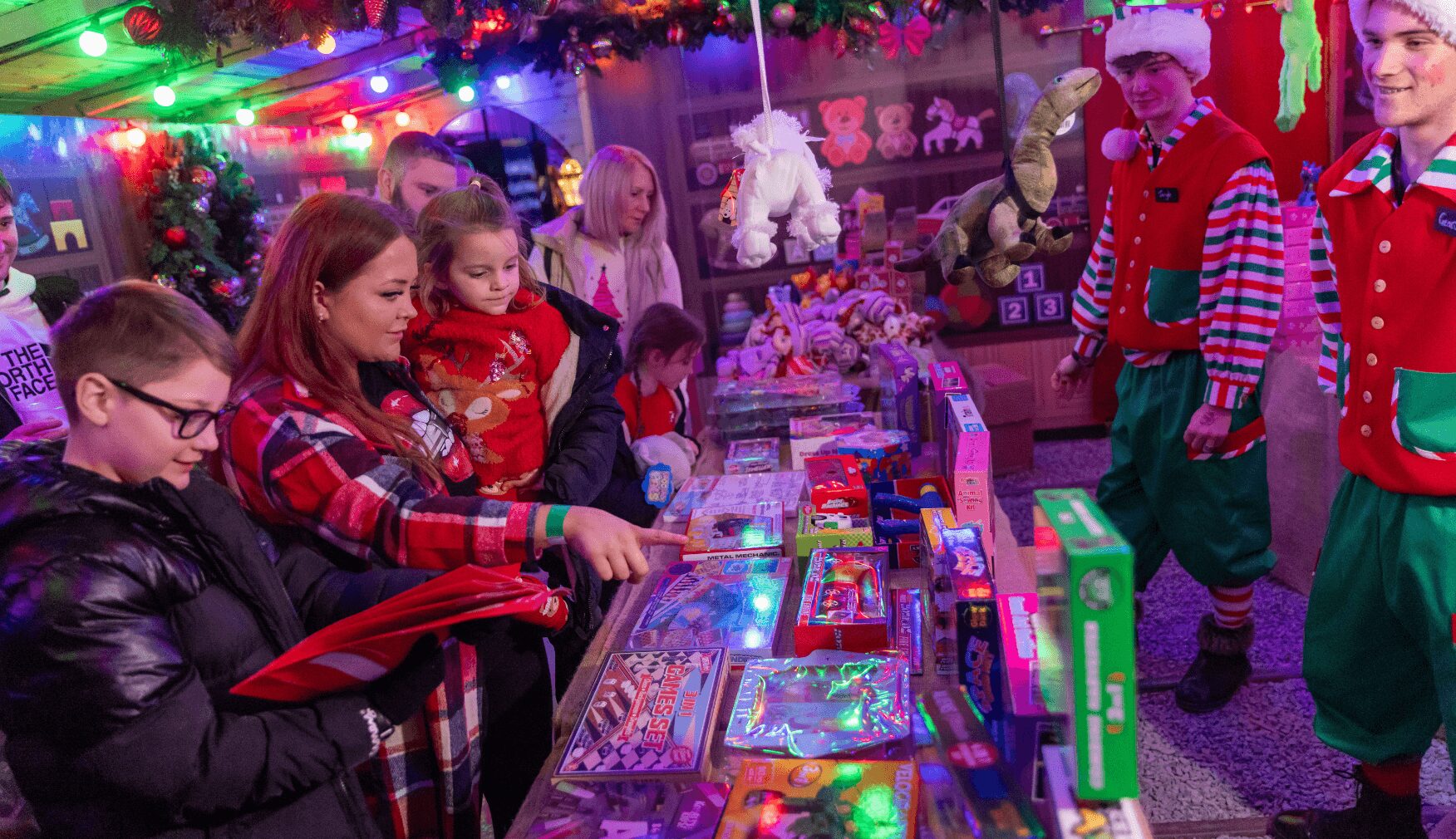 Family choosing presents at Statfold Country Park